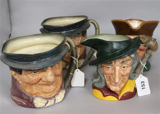 Two Doulton outsized character jugs, Toby Weller x 2, and two other large character jugs.